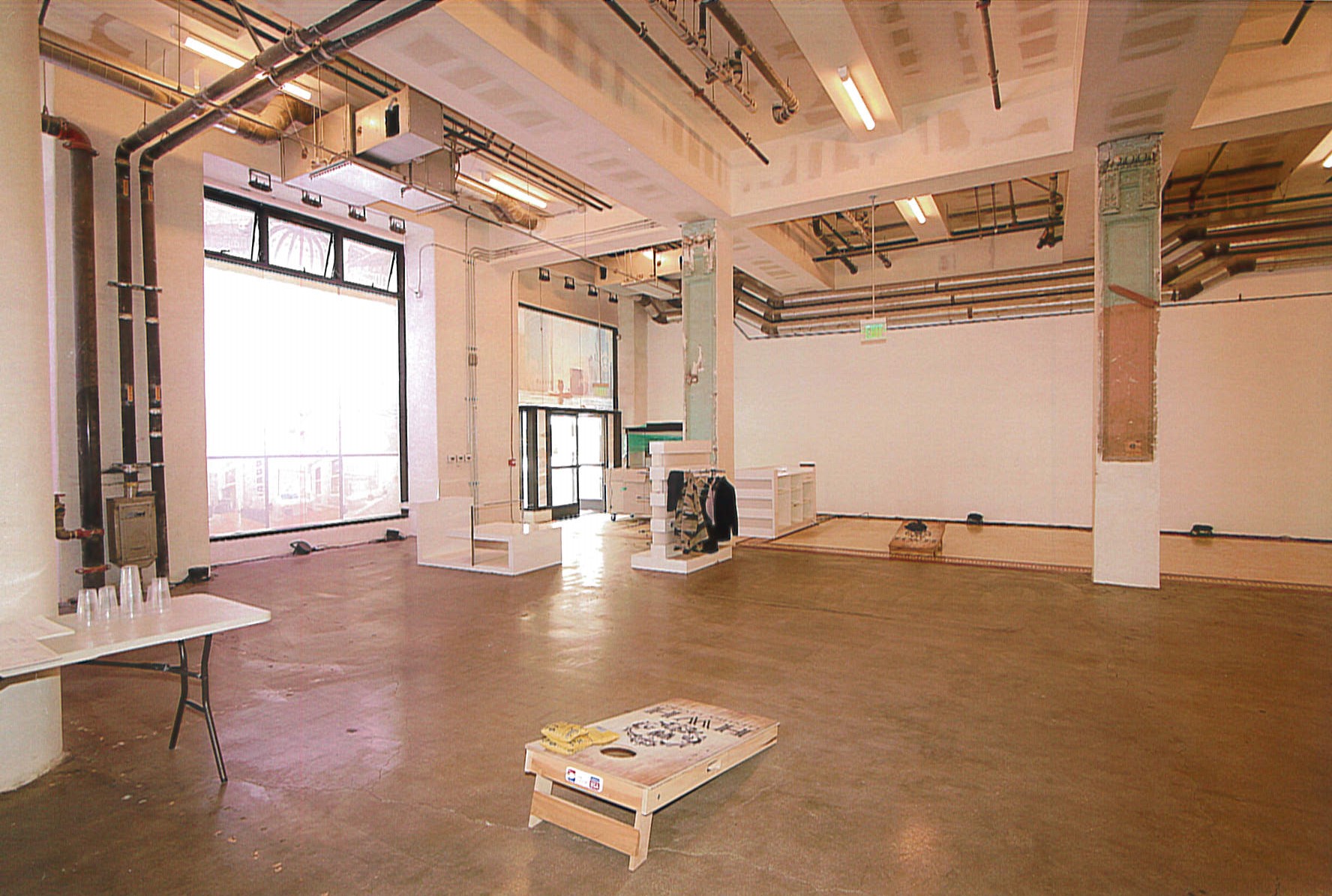 Rehabilitated first floor retail space. Drop ceiling has been removed